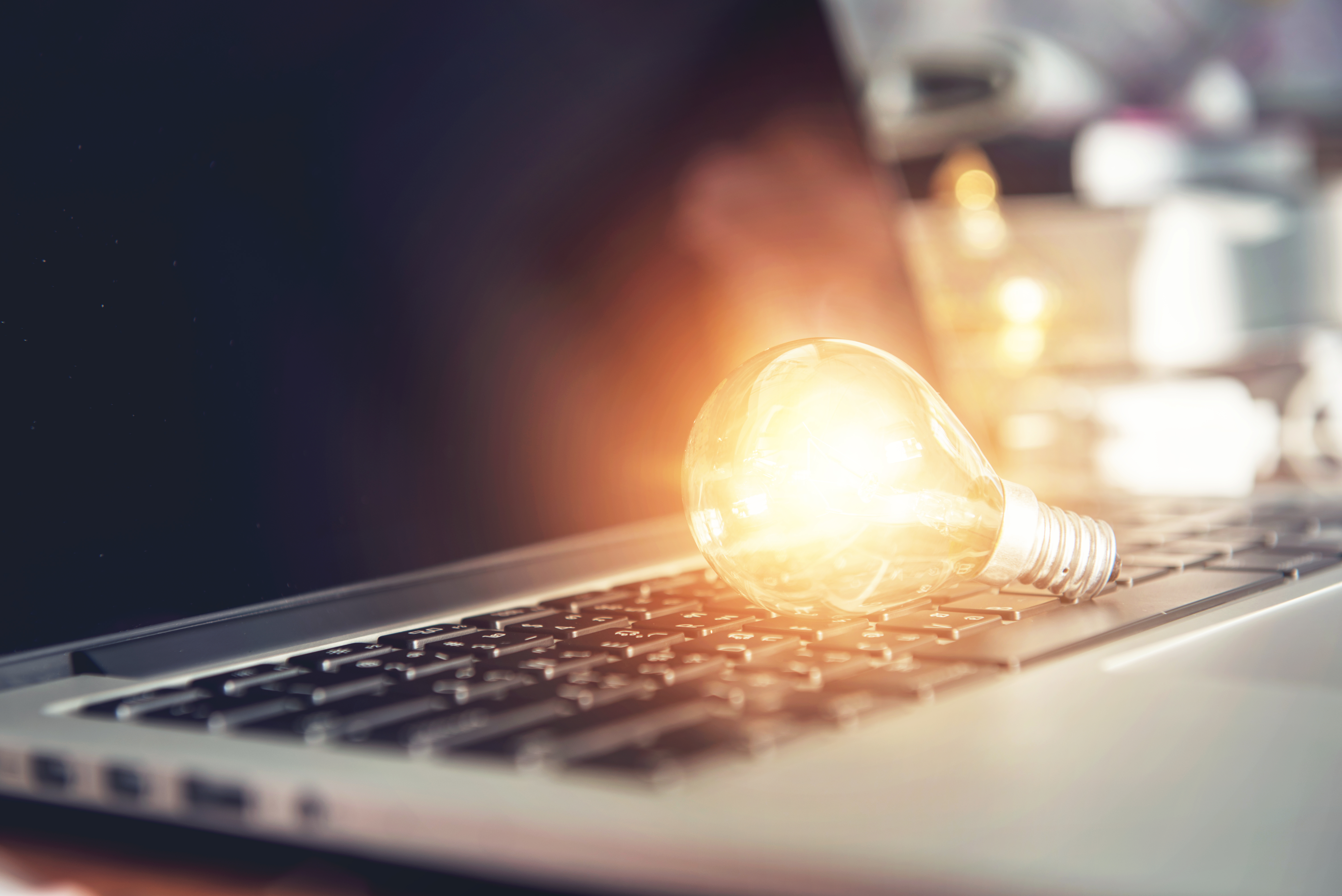light bulb on laptop